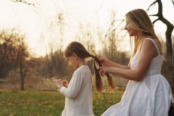 istock Happy family walks in the spring meadow 1145954507