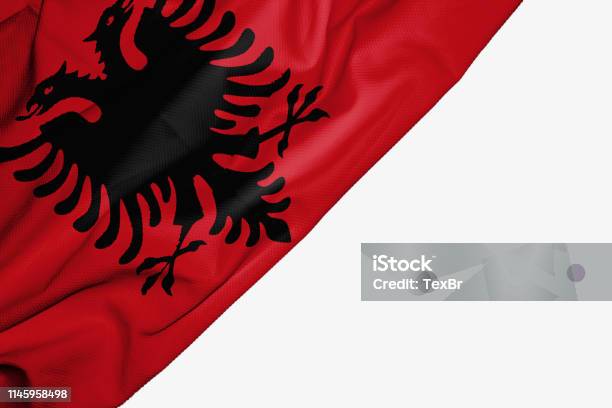 Albania Flag Of Fabric With Copyspace For Your Text On White Background Stock Photo - Download Image Now
