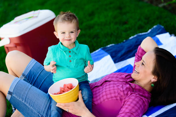istock Watermelon Yum with Mommy 1145959246