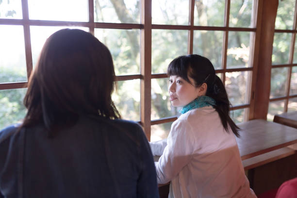 istock Young Friends Talking at cafe 1145961272