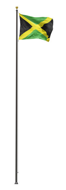 istock Jamaica flag flying on a tall flagpole, isolated on a white background 1145961311