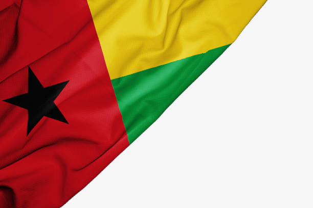 istock Guinea Bissau flag of fabric with copyspace for your text on white background 1145963269