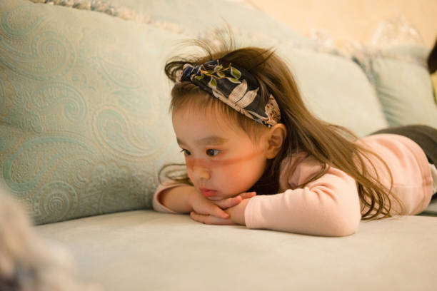 istock a young girl make up with cosmetic 1145964322