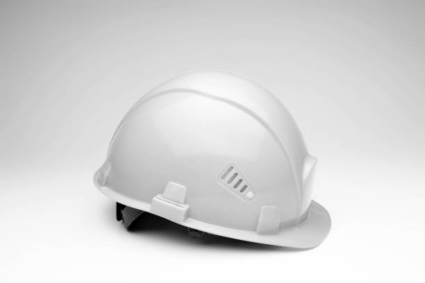 istock White construction helmet on a light background. The concept of architecture, construction, engineering, design. Copy space. 1145966540