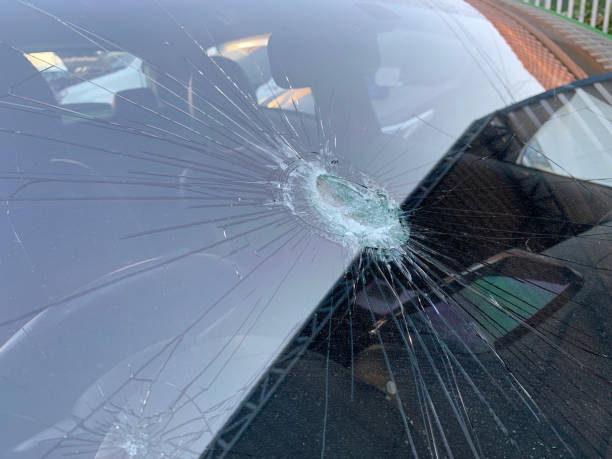istock Broken car windshield. Accident of car, close-up 1145967656
