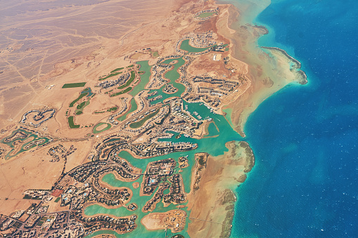 Aerial view of El Gouna a luxury Egyptian tourist resort located on the Red Sea 20 kilometres north of Hurghada with many hotels, pools, reefs, golf course etc.