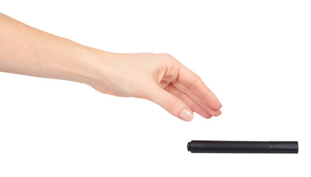 istock Hand with felt tip marker, drawing or writinng gesture. 1145977715