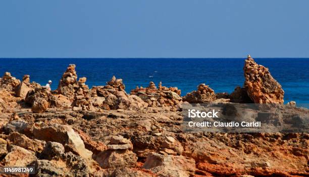 Cairns Manmade Stone Towers At Cap De Ses Salines Majorca Island Stock Photo - Download Image Now