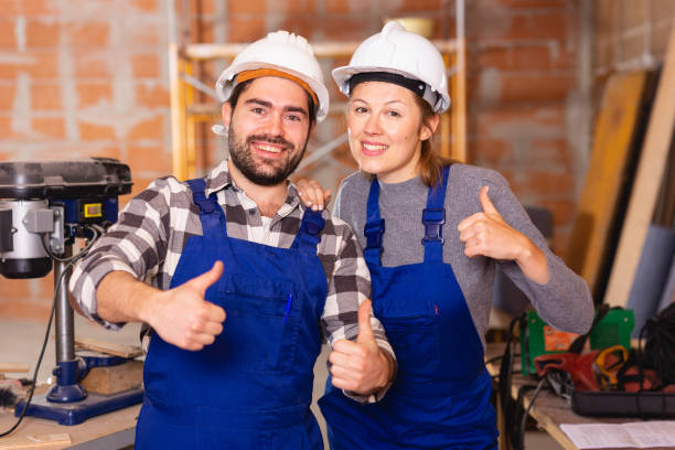 istock Two professional builders with thumbs up 1145990203