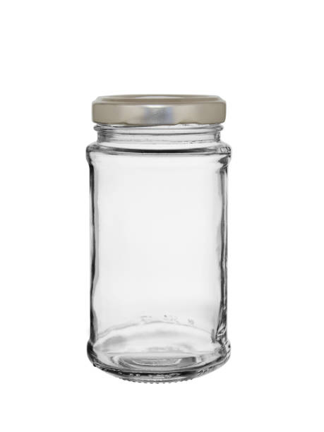 istock The empty glass jar closed by a metal cover on a white background 1145991734