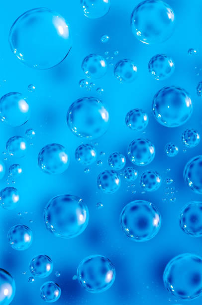 istock Macro air bubbles in water on a blue background 1145994859