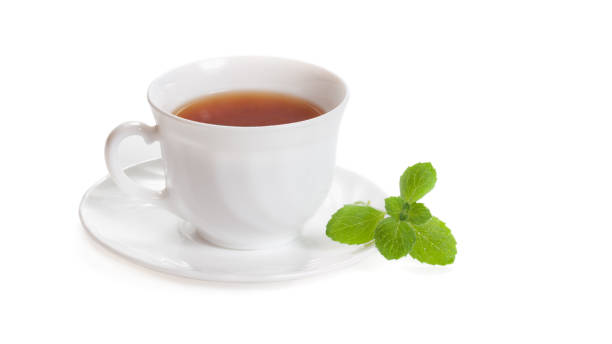 istock White Cup of tea with mint Melissa herb isolated 1145995189
