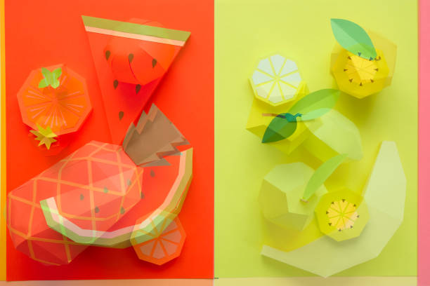 istock Fruit made of paper. Colorful background. Tropics. Flat lay. 1145998873