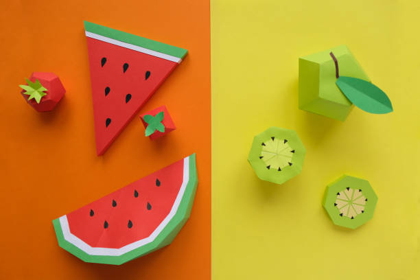 istock Fruit made of paper. Bright background. There's room for writing. 1145998910
