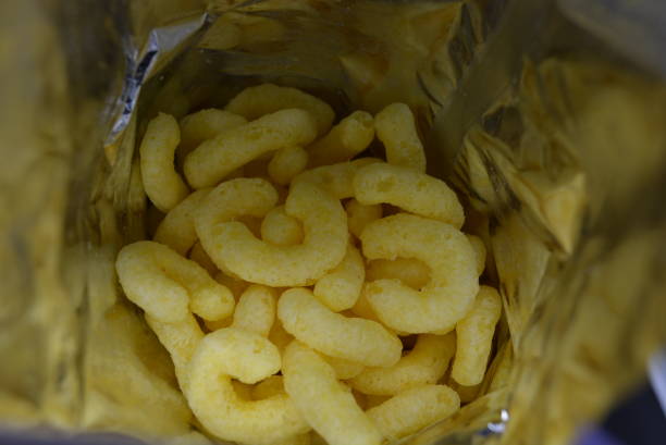 istock Delicious sweet corn sticks in silver packaging, snack, fast food. 1146000575