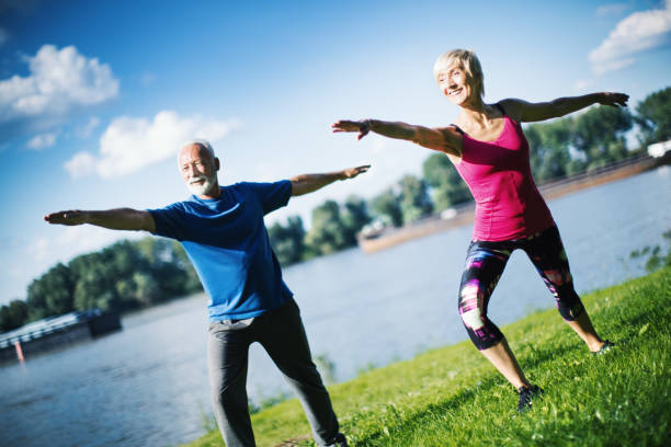 istock Yoga class outdoors. 1146006811