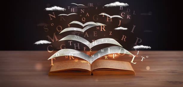 istock Pages and glowing letters flying out of a book 1146007065