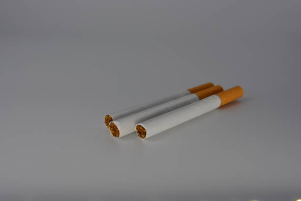 istock Cigarette, cigarettes with tobacco and cigarette sets on a white background, smoking and harm to health. 1146007964