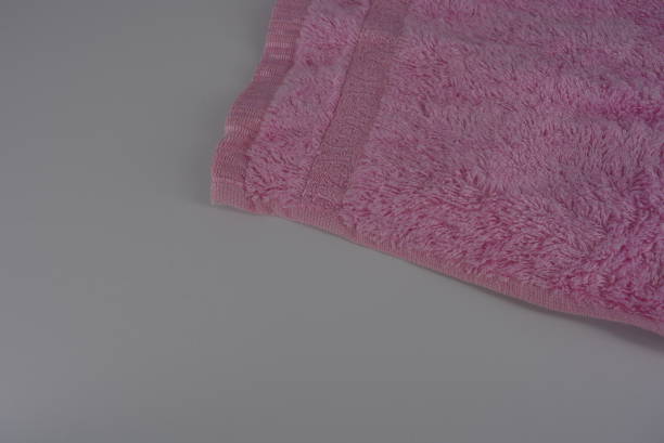 istock Pink terry towel, bamboo cloth, bamboo towel on a white background. 1146008011