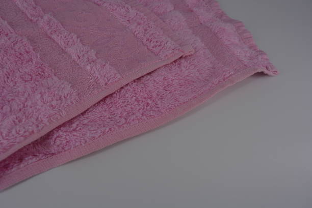 istock Pink terry towel, bamboo cloth, bamboo towel on a white background. 1146008014
