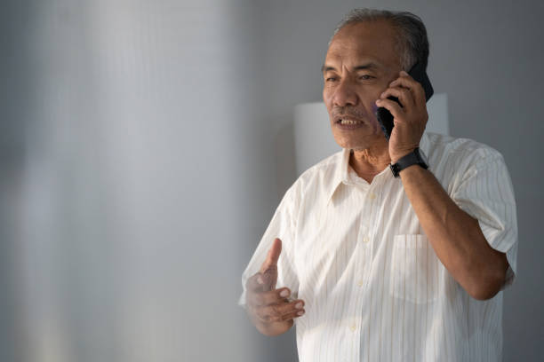 istock a experienced businessman talking by phone using a smartphone to two way communication 1146010402
