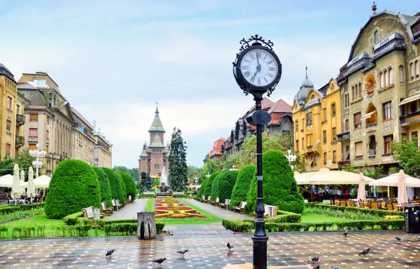 Timisoara center square with Orthodox Cathedral on background, Romania. Composite photo
