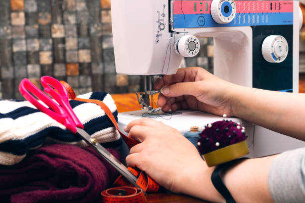 istock closeup women sewing on a machine 1146013060