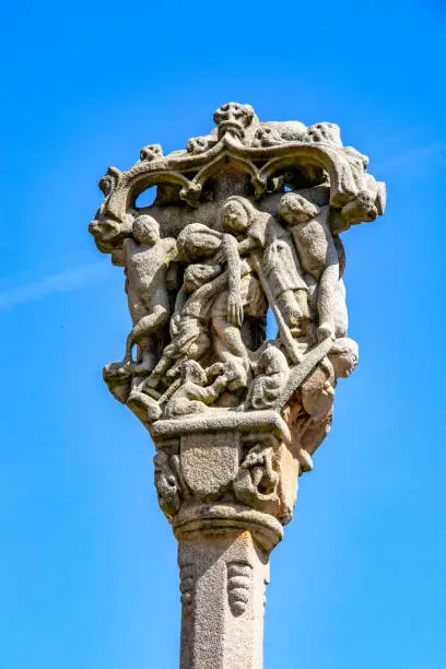 Photo of Rochefort-en-Terre. The Calvary on the church square. Morbihan. Brittany