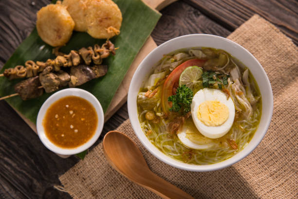 istock soto ayam, chicken soup with curry 1146015648
