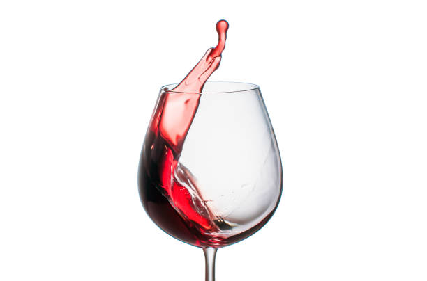 istock Splashing red wine in a glass 1146016025