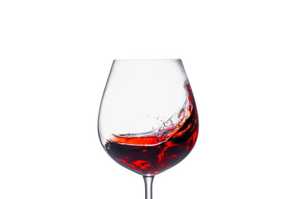 istock Splashing red wine in a glass 1146016027
