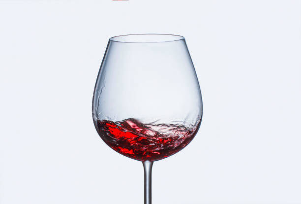 istock Splashing red wine in a glass 1146016046
