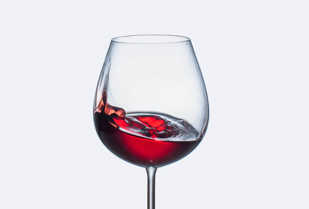 istock Splashing red wine in a glass 1146016051