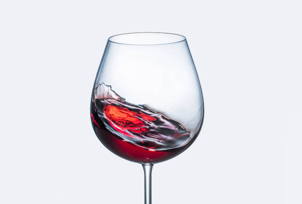 istock Splashing red wine in a glass 1146016053