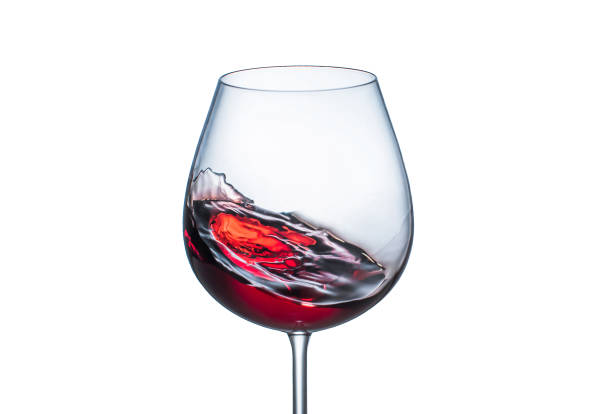 istock Splashing red wine in a glass 1146016091