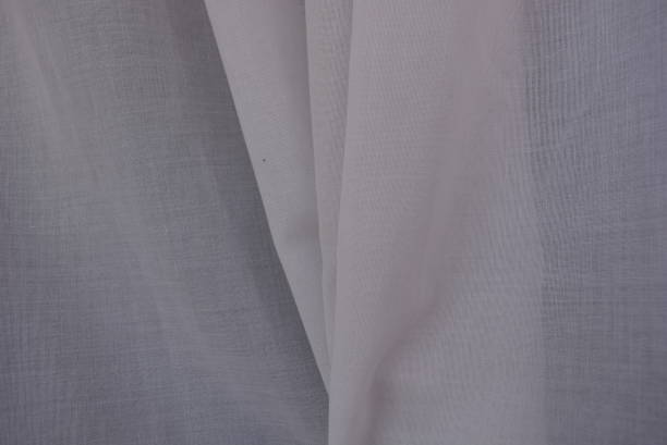 istock White cotton fabric with waves, color and style. 1146016950