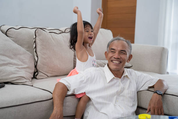 istock happy lovely asian kid with her grandpa 1146020196