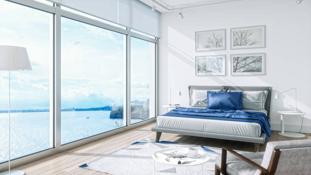 modern bedroom interior with sea view - contemporary bed luxury hotel room imagens e fotografias de stock