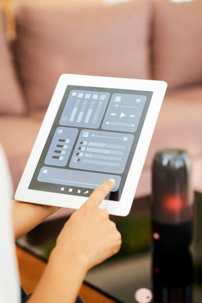 istock Woman controlling the music with online application 1146021535