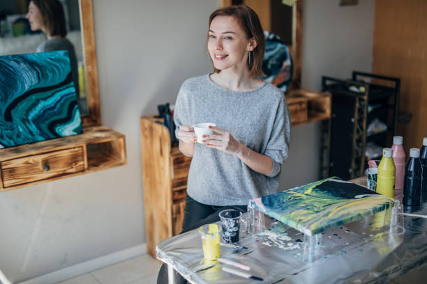 Beautiful lady artist in art studio