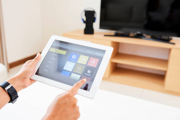 istock Woman using online application to watch TV 1146023073