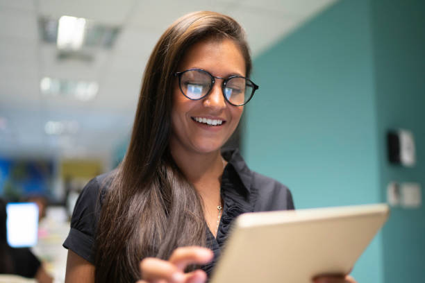 istock Businesswoman using digital tablet in office 1146024484