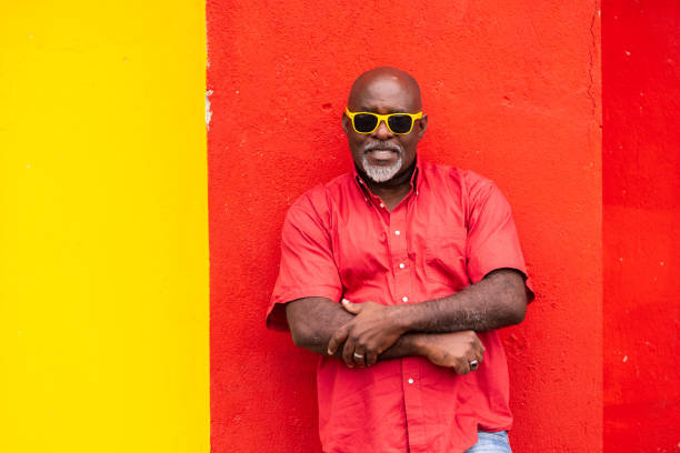 istock Mature afro man portrait on colorful background 1146027062