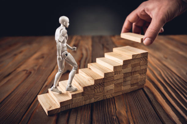 istock Career Planning Concept. Businessman Getting Help Achieving Goals. 1146028291