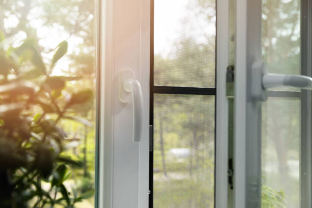 opened plastic pvc window with mosquito net wire screen installed - netting imagens e fotografias de stock