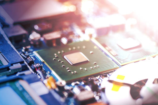 istock Computer Technology: Close up of a computer chip on a circuit board, sunbeam 1146033021