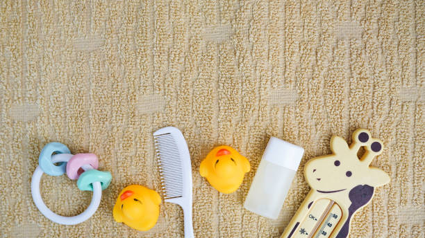 istock Baby accessories for bathing and toy on towel with copy space, flat lay 1146033578