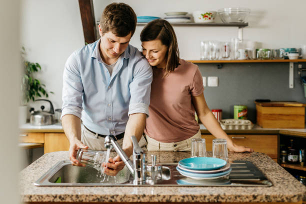 istock Husband washing the dishes 1146034389