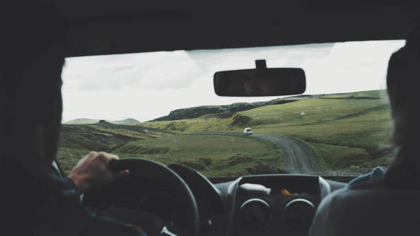 istock Traveling couple. Driver's POV 1146034663