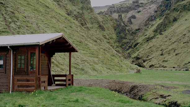 istock Wooden cabins surrounded by mountains 1146038039